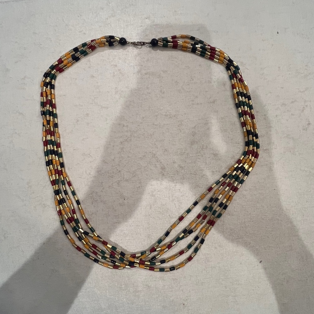 Vintage Multicolor primary and shiny gold Beaded multi strand Necklace. GUC!